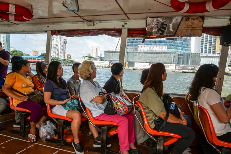 Passengers on Chao Phraya Express Boat | Chao Phraya River Sightseeing | Bangkok Food Tours