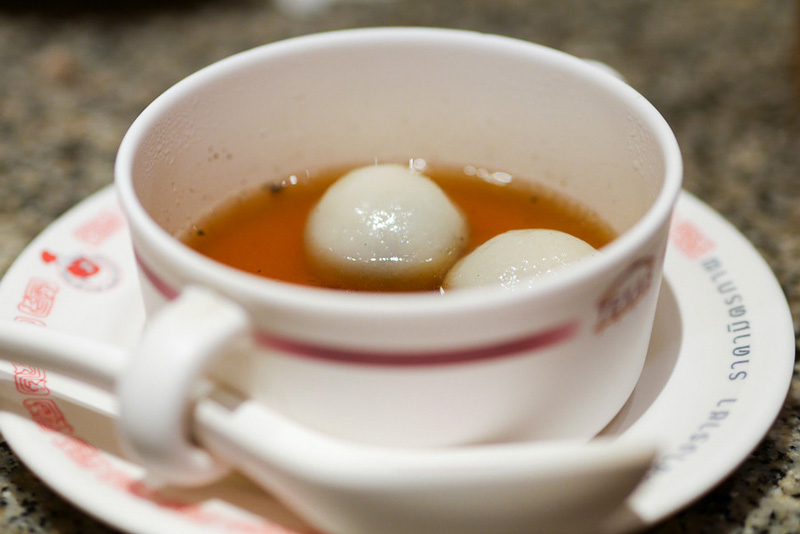 sesame balls in ginger tea | Chinatown food tour in Bangkok | Bangkok Food Tours
