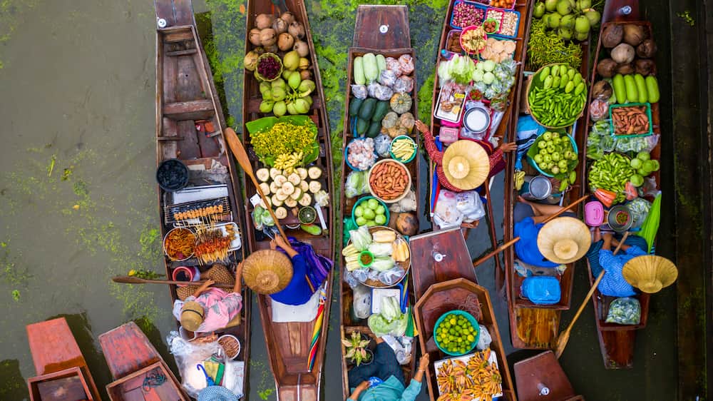Shop, eat and immerse yourself in the magic of floating markets